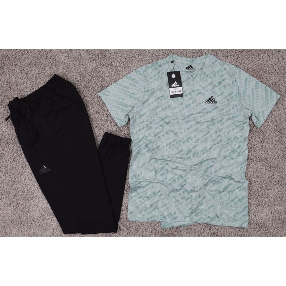 ترينج رياضي من تورنيدو رجالي رمادي بترولي لبني أزرق