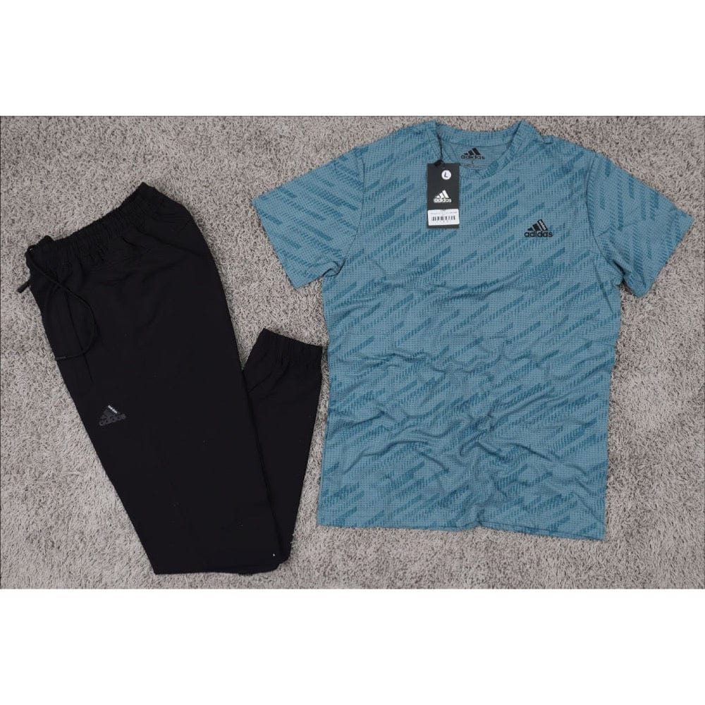 ترينج رياضي من تورنيدو رجالي رمادي بترولي لبني أزرق