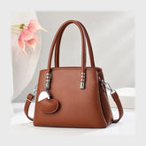 شنطة يد حريمى جلد 2اسود*لون جميع المواسم من فلامنجو - 92