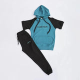 ترينج تيشيرت بكابيشوه وبنطلون اولادي بسكوته الوان متعددة صيفي من فرعون-5042