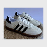 حذاء سنيكرز حريمى فوندي جلد إسكاي مستورد ونعل PVC حقن ابيض-اسود جميع المواسم من ساندي - 498-WH-BK