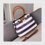 شنطة يد حريمى جلد 2اسود*لون جميع المواسم من فلامنجو - 572