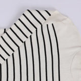 بلوفر بيزك مقلم حريمى تريكو ابيض شتوي من اتش - Body-WH