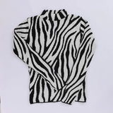 بلوفر رسومات حريمى تريكو ابيض في اسود شتوي من اتش - Zebra