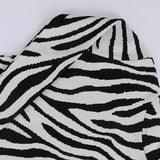 بلوفر رسومات حريمى تريكو ابيض في اسود شتوي من اتش - Zebra